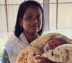 A precious newborn baby after a long and challenging journey